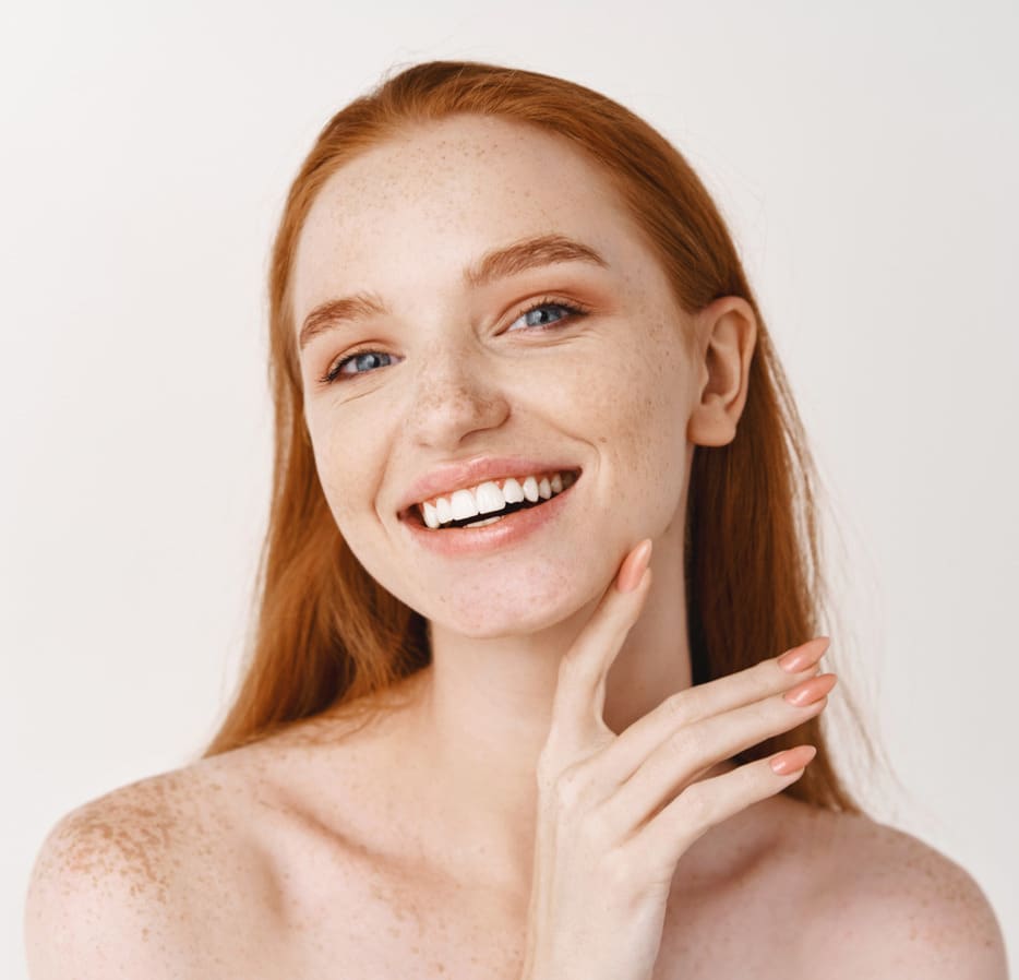 Smiling red-headed woman