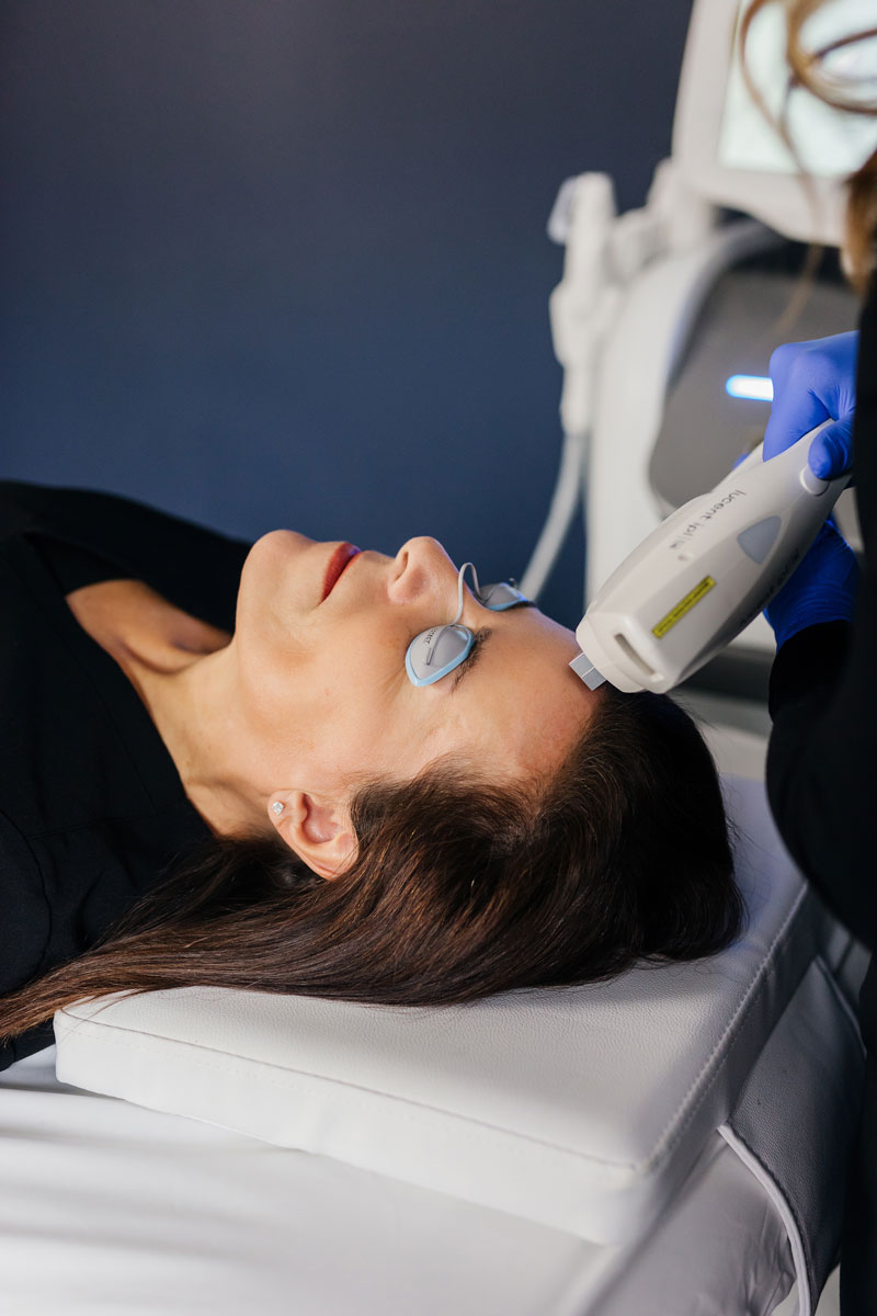 A relaxed patient receiving a skin treatment at Renew MedSpa in Eagan, MN